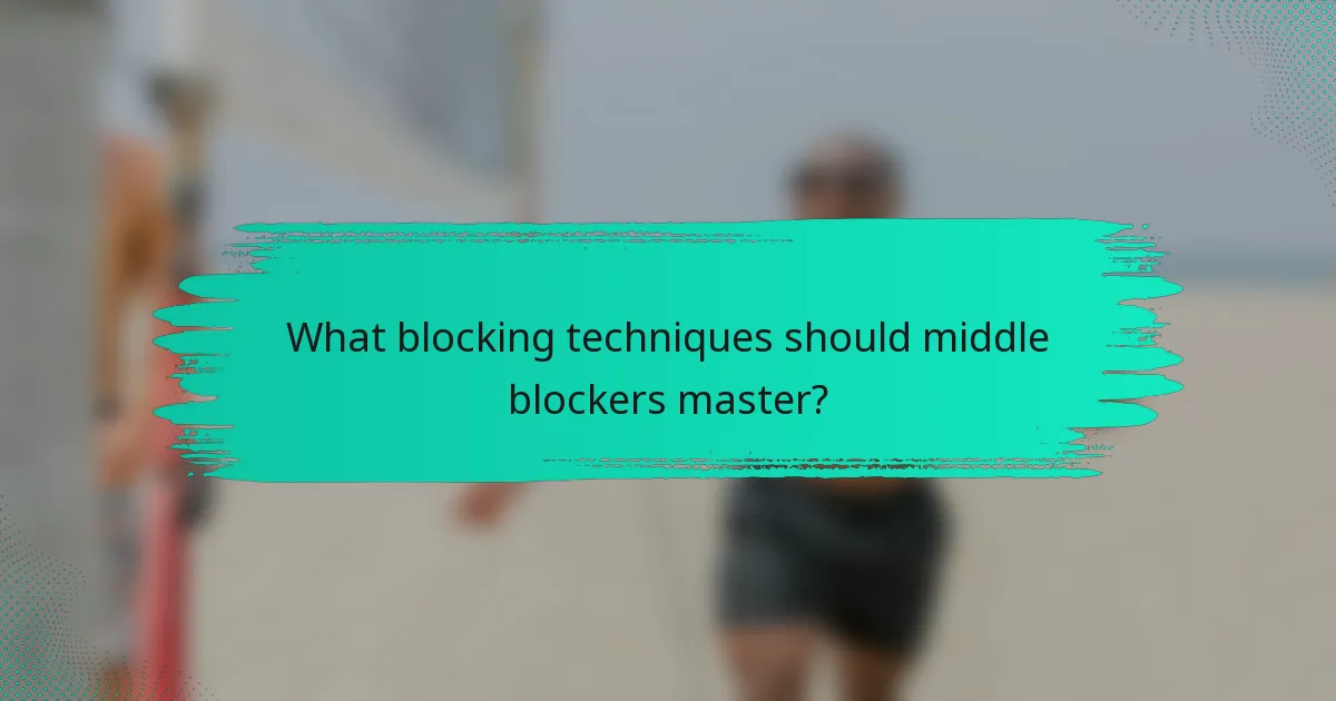 What blocking techniques should middle blockers master?